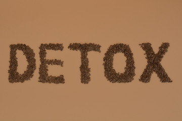 The word detox is made from flax seeds. Diet concept, body cleansing, healthy nutrition.