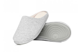 Pair of blank soft black home slippers, design mockup. Hotel bath slippers top view isolated on white background. Clear warm domestic sandal or sneakers. Bed shoes accessory footwear.