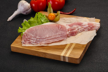 Raw pork bacon