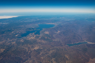 Fototapeta na wymiar Flying over mountains - Lakes - U.S. lanscapes