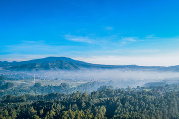 Mountain Landscape With Blue and Misty Sky