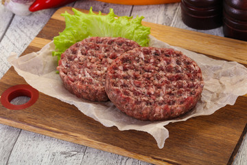 Raw burger cutlet