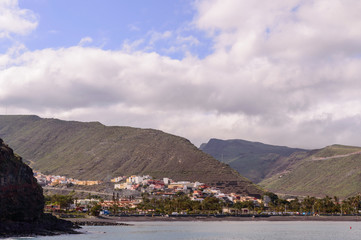 Fototapeta na wymiar Magnificent Views From The High Seas Of The Island Of La Gomera. April 15, 2019. La Gomera, Santa Cruz de Tenerife Spain Africa. Travel Tourism Photography Nature.
