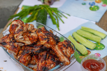 grilled chicken wings with vegetables