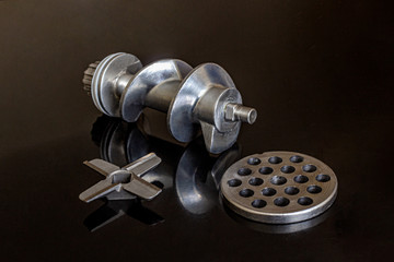 Screw, four-blade knife and grating for grinding an electric meat grinder
