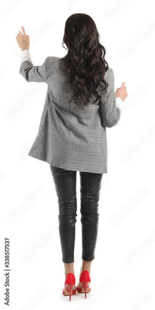 Poster young businesswoman using virtual screen on white background