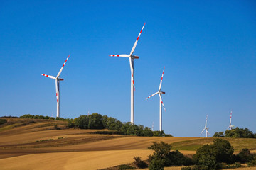 Wind turbines for electric power production. Green ecological power energy generation. Austria.