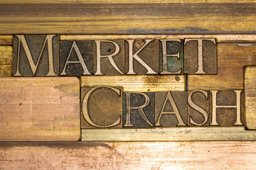Photo of real authentic typeset letters forming Market Crash text on vintage textured grunge copper...