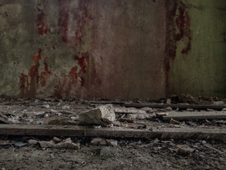 Dust, sand and rocks on the floor of an abandoned building