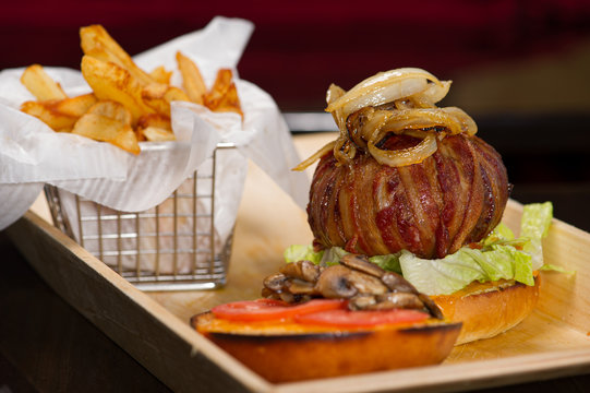 Bacon Wrapped Burger And Fries