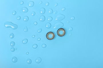 Contact lenses on color background