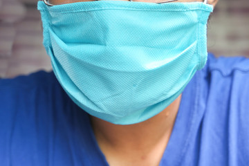 Man wearing hygienic mask to prevent infection