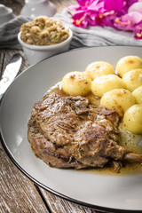Roasted duck leg.