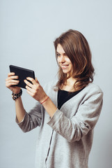 young woman using digital tablet computer