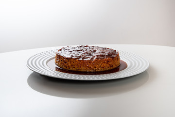 Quesillo Flan Creme Caramel  on white plate white background