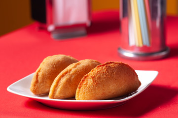 Chicken risoles with banana and rapadura honey. Gastronomy of northeastern Brazil