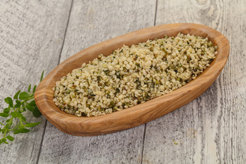 Peeled hemp seeds in the bowl