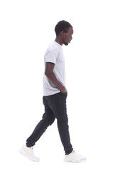Naklejka premium in full growth. handsome guy in jeans and a t-shirt