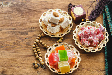 Turkish delight sweets on a metal oriental plate close up