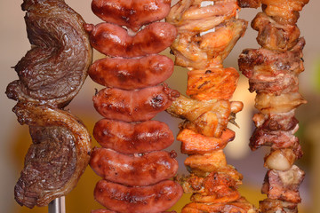 Barbecue. Meat, linguica, chicken and bacon skewers. Typical of popular Brazilian gastronomy