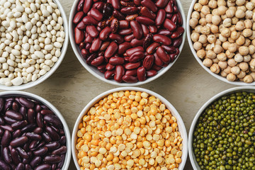 Beans assortment on white stone table