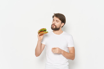 young man eating a sandwich