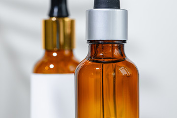 Close up photo of glass cosmetics container for oily texture products