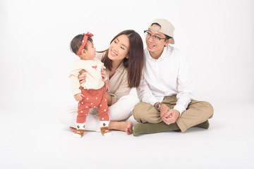 Happy Asian family on white background