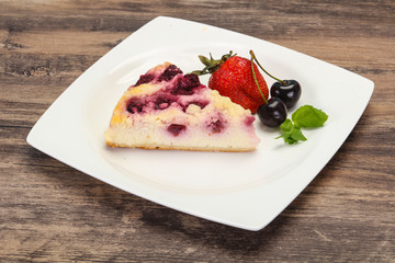 Cheesecake with cherry served strawberry