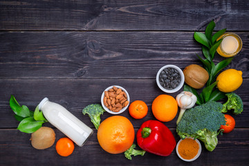 A variety of products to maintain immunity on a black background. Disease Prevention Concept. Copy space