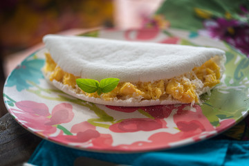 Gastronomy. Cheese and coconut tapioca, typical food from the northeast region of Brazil, made with...
