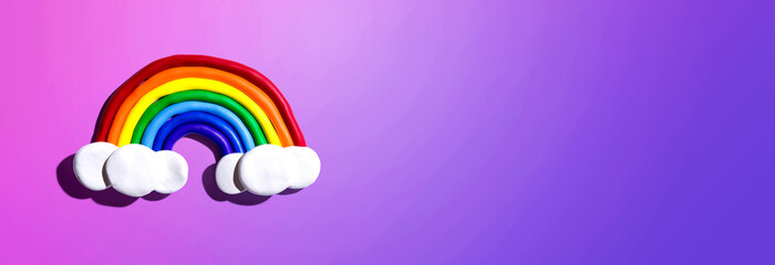 Rainbow and white clouds made with clay - overhead view