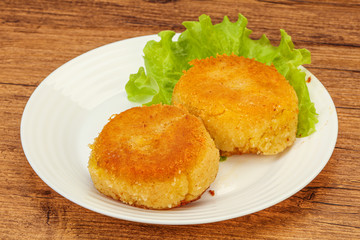 Vegan cuisine - Potato cutlet in the plate