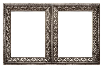 Fototapeta premium Double silver frame (diptych) for paintings, mirrors or photos isolated on white background