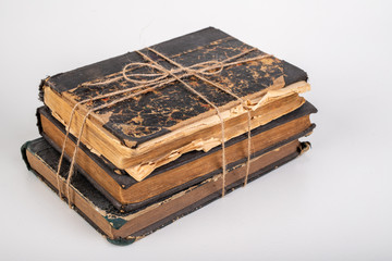 Old books bound with jute twine. Old publications prepared for archiving.