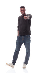Fototapeta premium cheerful stylish guy pointing at you. isolated on white