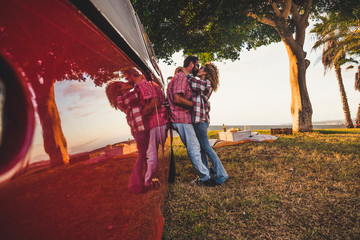 Romantic adult of caucasian couple kiss and hug together in outdoor leisure activity picnic in...