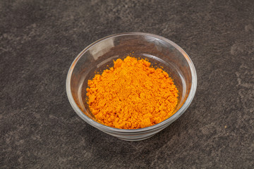 Tumeric powder in the bowl