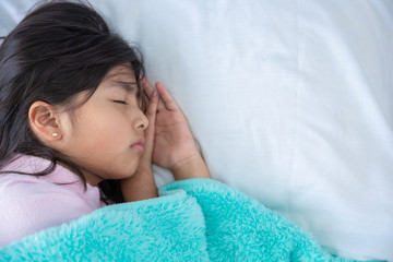 girl in bed resting at home due to coronavirus pandemic in mexico