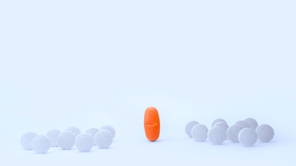 White and orange pills collection on white background. Vitamin deficiency, avitaminosis concept. Homeopathy cure treatment, Healthy Lifestyle, Protection from virus. Front view