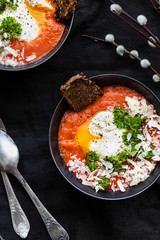 Jewish breakfast with poached egg 