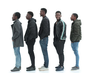 Obraz premium group of diverse guys standing in turns . isolated on white