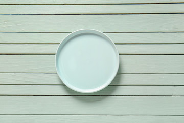 Fototapeta na wymiar Clean plate on wooden background
