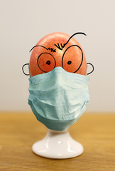 funny easter egg with covid mask