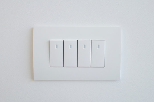 The block of switches from four elements of white color with LED illumination.