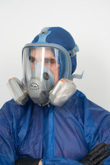 portrait of a man in protective clothing and a mask close up