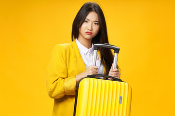 young woman with suitcase