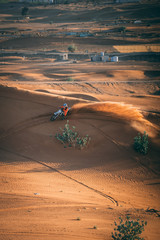 biker sunset in the desert