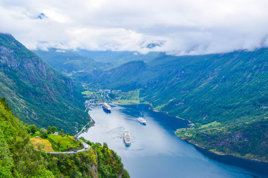 The cruise liners at the end of Geirangerfjord, near small village of Geiranger. View from Eagles Road. Norway. © jana_janina