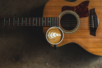 A latte on an acoustic guitar